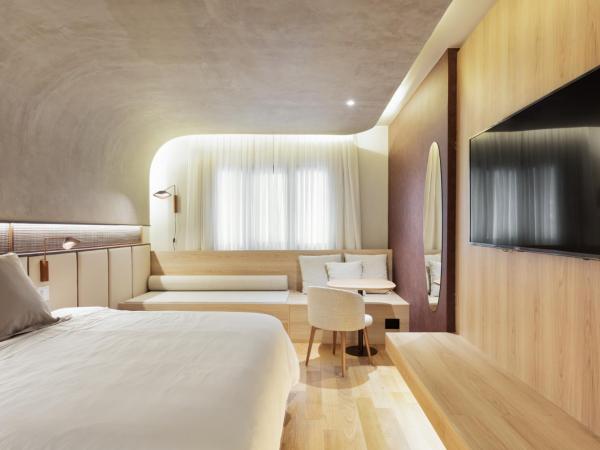 QOYA Hotel Curitiba, Curio Collection by Hilton : photo 1 de la chambre chambre lit king-size deluxe