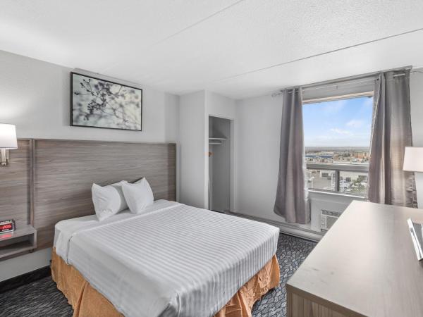 Emerald Hotel & Suites Calgary Airport : photo 2 de la chambre studio lit queen-size 