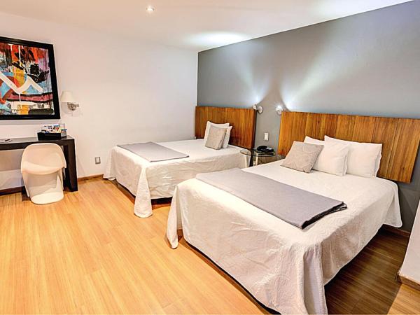 Hotel CLARUM 101 : photo 4 de la chambre chambre deluxe avec 2 lits doubles