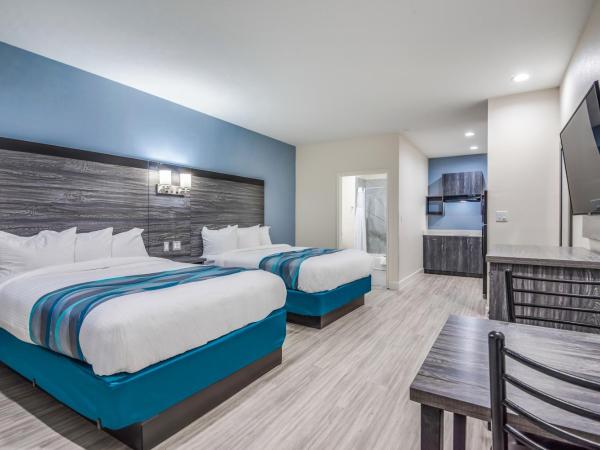 Americas Best Value Inn & Suites Houston at Hwy 6 : photo 1 de la chambre chambre lit queen-size