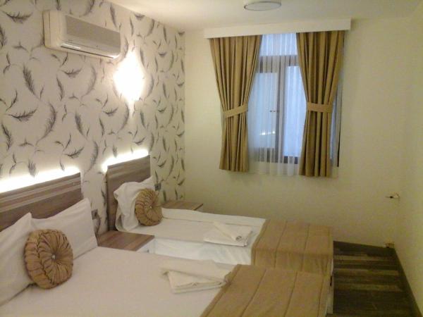 Olimpiyat Hotel Izmir : photo 7 de la chambre chambre quadruple standard