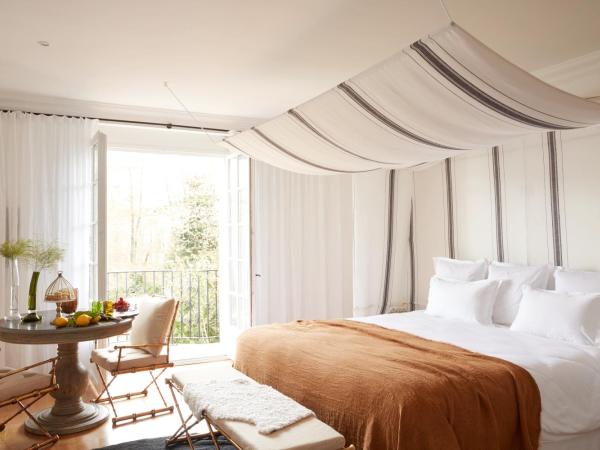 Brindos, Lac & Château - Relais & Châteaux - Anglet Biarritz : photo 5 de la chambre chambre double ou lits jumeaux - vue sur jardin