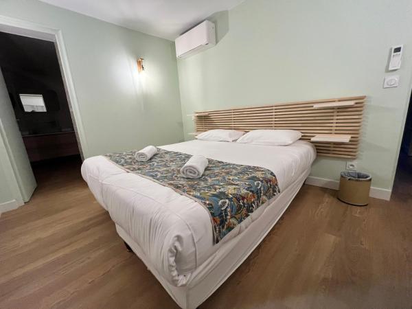 Hôtel Astria : photo 3 de la chambre chambre quadruple confort