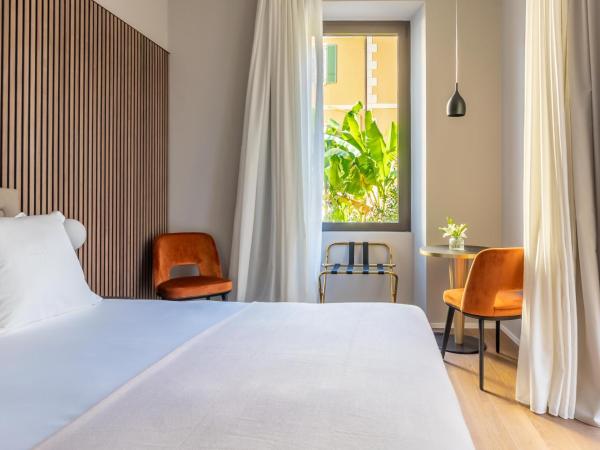 Binario 934 Smart Hotel : photo 8 de la chambre chambre lit queen-size avec balcon