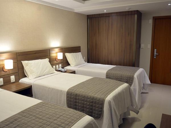 Pituba Praiamar Hotel : photo 3 de la chambre chambre triple exécutive
