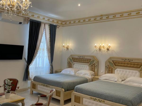 Chambre Familiale Maison de L'Église du Couvent : photo 1 de la chambre chambre familiale avec salle de bains privative