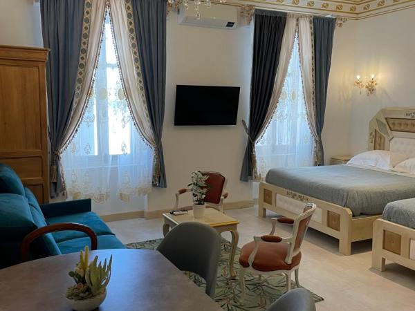 Chambre Familiale Maison de L'Église du Couvent : photo 2 de la chambre chambre familiale avec salle de bains privative