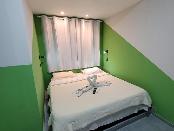 Maraca Hostel : photo 8 de la chambre chambre double ou lits jumeaux avec salle de bains commune