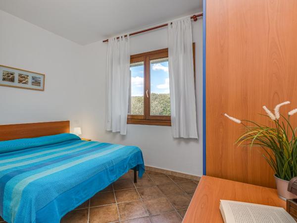 Le Dimore di Nettuno - Happy Rentals : photo 3 de la chambre appartement - vue sur piscine