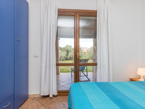 Le Dimore di Nettuno - Happy Rentals : photo 8 de la chambre appartement - vue sur piscine