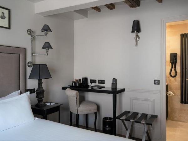 Hotel Saint-Louis en L'Isle - Notre-Dame : photo 3 de la chambre chambre double ou lits jumeaux supérieure avec balcon