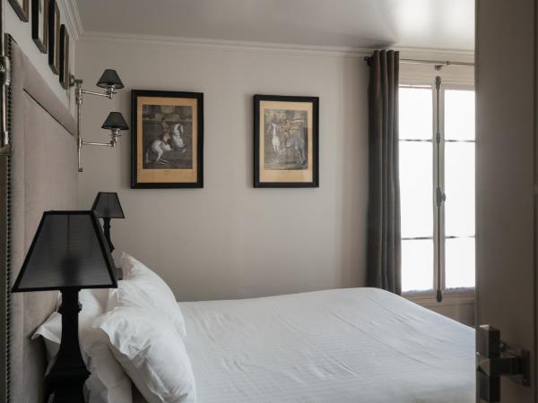 Hotel Saint-Louis en L'Isle - Notre-Dame : photo 1 de la chambre chambre double confort avec balcon