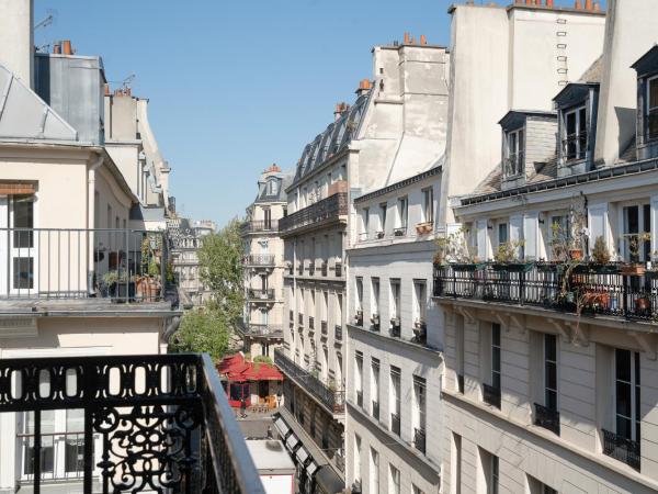 Hotel Saint-Louis en L'Isle - Notre-Dame : photo 4 de la chambre chambre double confort avec balcon