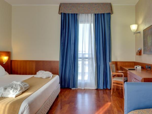 Hotel Raffaello : photo 4 de la chambre chambre familiale (2 adultes et 2 enfants)