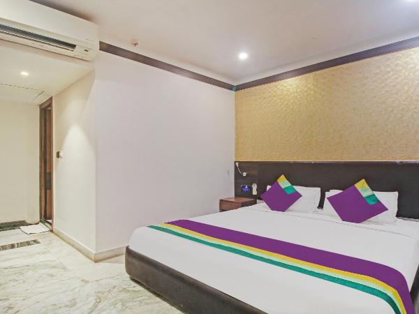Treebo Premium Dee Empresa : photo 3 de la chambre chambre double deluxe