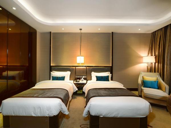 Pacific Regency Hotel Suites : photo 1 de la chambre suite premier de luxe lits jumeaux