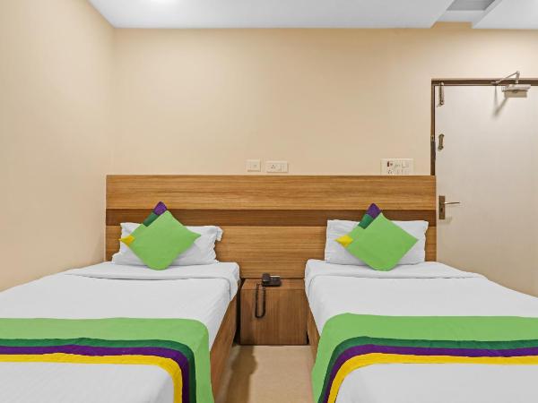 Treebo Pride Inn Botanica : photo 8 de la chambre chambre double standard