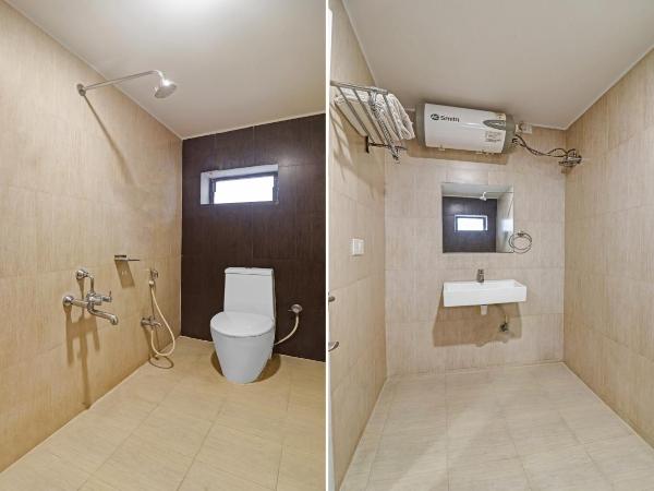 Treebo Pride Inn Botanica : photo 7 de la chambre chambre double standard