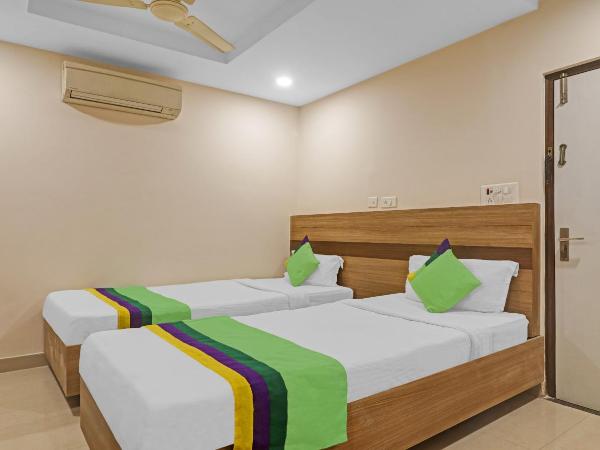 Treebo Pride Inn Botanica : photo 2 de la chambre chambre double standard