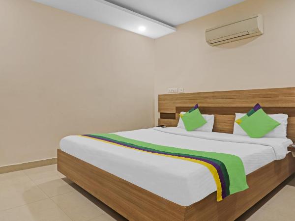 Treebo Pride Inn Botanica : photo 1 de la chambre chambre double supérieure