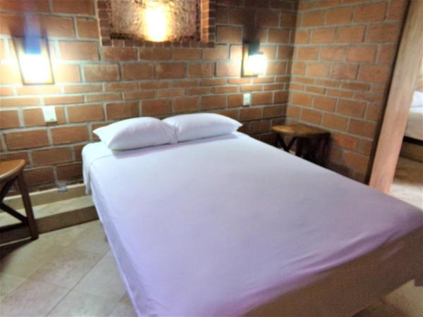Hotel Casa de Lirio Diamante : photo 3 de la chambre chambre lits jumeaux