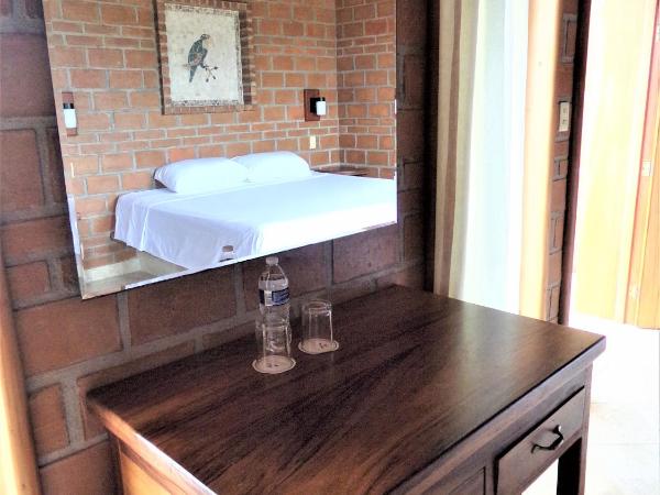 Hotel Casa de Lirio Diamante : photo 2 de la chambre chambre lit king-size standard