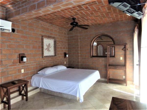 Hotel Casa de Lirio Diamante : photo 3 de la chambre chambre lit king-size standard