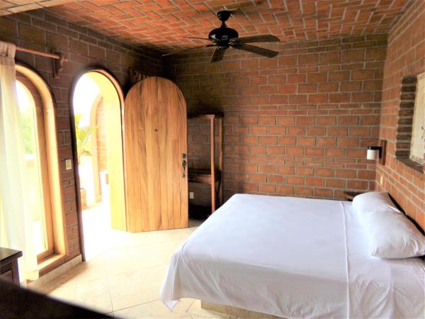 Hotel Casa de Lirio Diamante : photo 4 de la chambre chambre lit king-size standard