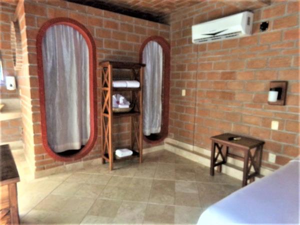 Hotel Casa de Lirio Diamante : photo 5 de la chambre chambre lit king-size standard