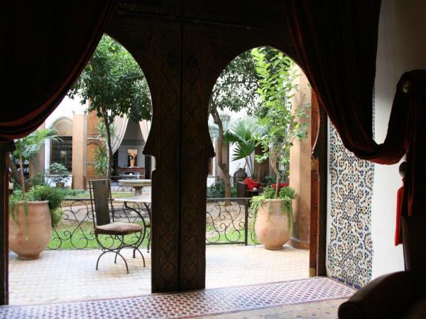 Riad Laaroussa : photo 8 de la chambre suite orange (2 adultes)