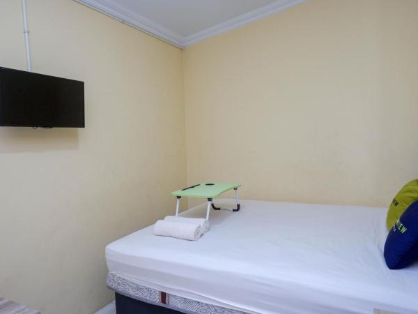 Urbanview Hotel Jogja City Mall : photo 5 de la chambre chambre double standard
