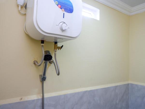 Urbanview Hotel Jogja City Mall : photo 10 de la chambre chambre double deluxe