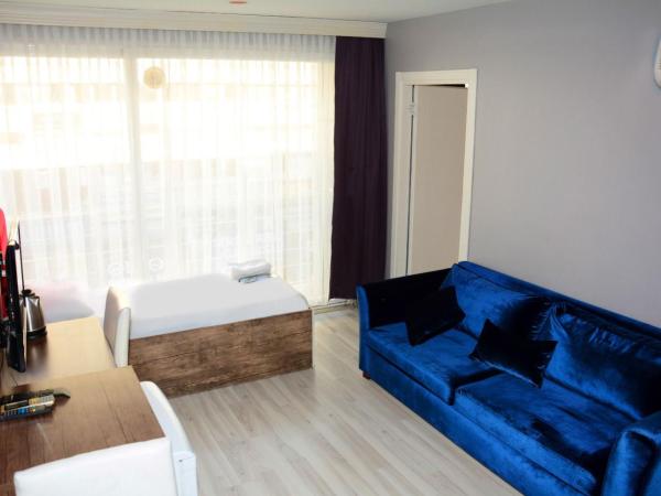 palmiye suıt otel : photo 2 de la chambre appartement