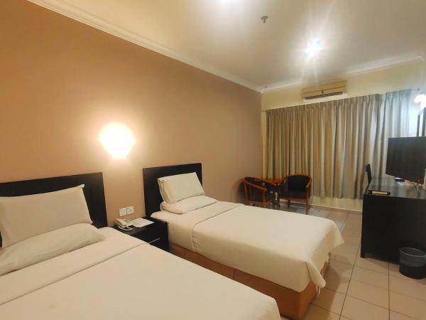 Megah D'aru Hotel : photo 3 de la chambre chambre lits jumeaux standard
