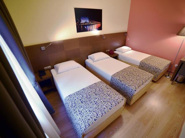 Orestias Kastorias : photo 6 de la chambre chambre triple