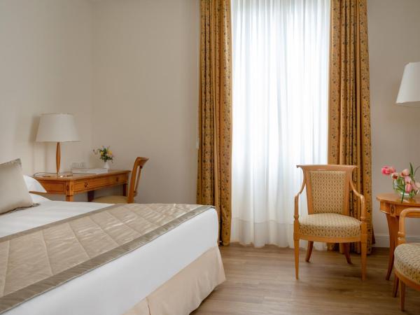 Residenza Parco Fellini : photo 2 de la chambre chambre triple supérieure