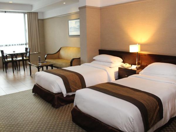 Pacific Regency Hotel Suites : photo 4 de la chambre chambre lits jumeaux supérieure