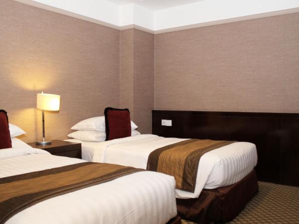 Pacific Regency Hotel Suites : photo 6 de la chambre suite familiale