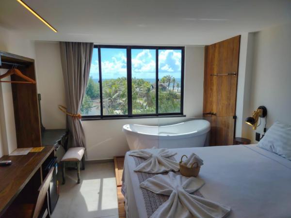 Malai Boutique Hotel : photo 3 de la chambre suite lit queen-size – vue sur mer