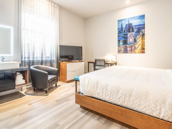 Hôtel Manoir Vieux-Québec : photo 3 de la chambre chambre lit king-size standard