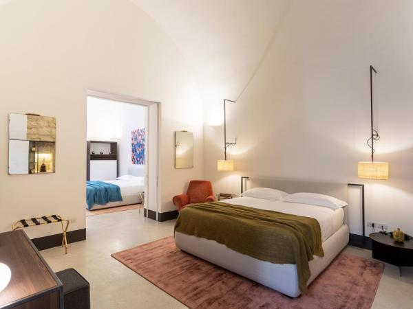 Palazzo De Noha - Boutique Hotel : photo 2 de la chambre suite lit king-size avec baignoire spa - annexe