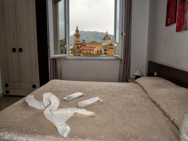 Le Cupole Decò : photo 2 de la chambre chambre double ou lits jumeaux deluxe - vue sur ville