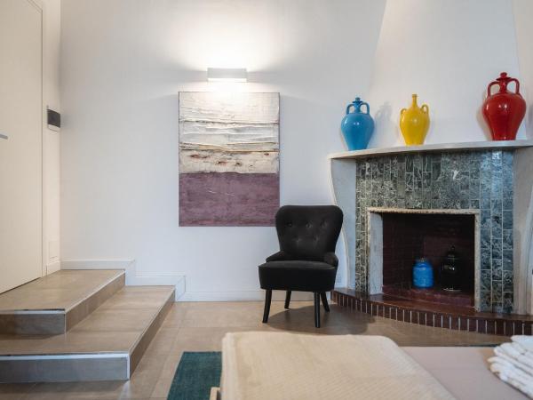 Fourooms - Bari Sparano : photo 5 de la chambre grande chambre double avec cheminée