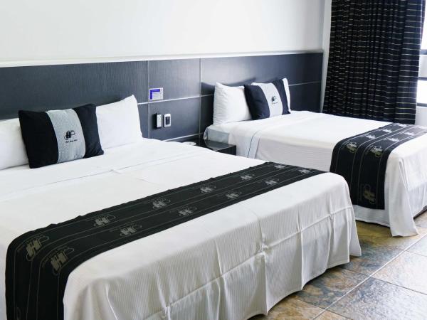 Hotel Ibiza Plaza : photo 4 de la chambre chambre avec 2 grands lits queen-size 