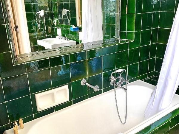 Domaine du Paradis des Oiseaux : photo 2 de la chambre chambre double ou lits jumeaux - vue sur jardin