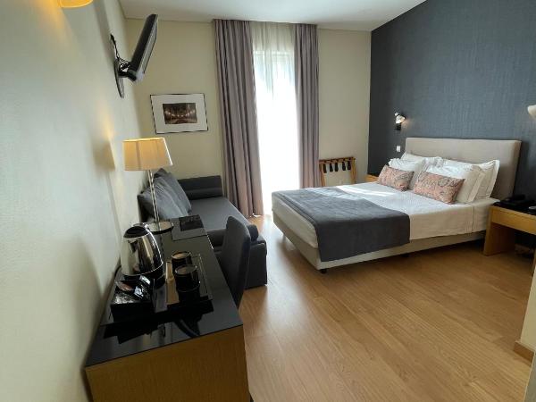 Hotel Sete Colinas : photo 3 de la chambre chambre double supérieure avec lit d'appoint