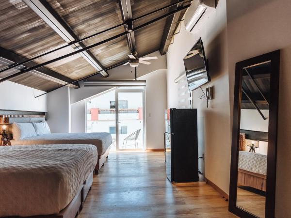 Loft Hotel Malecón Vallarta : photo 1 de la chambre suite deluxe avec lit king-size