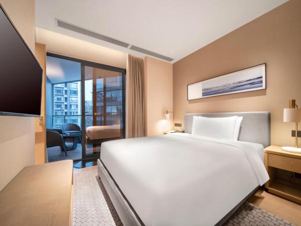 Primcasa Chengdu : photo 1 de la chambre chambre double ou lits jumeaux deluxe avec balcon