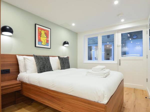 Shepherds Bush Green Serviced Apartments by Concept Apartments : photo 1 de la chambre studio - sous-sol
