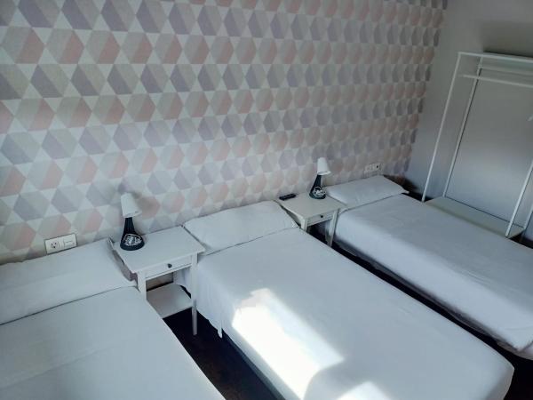 Pensión Boutique AdMera Cerca hospital Clínico : photo 6 de la chambre chambre triple